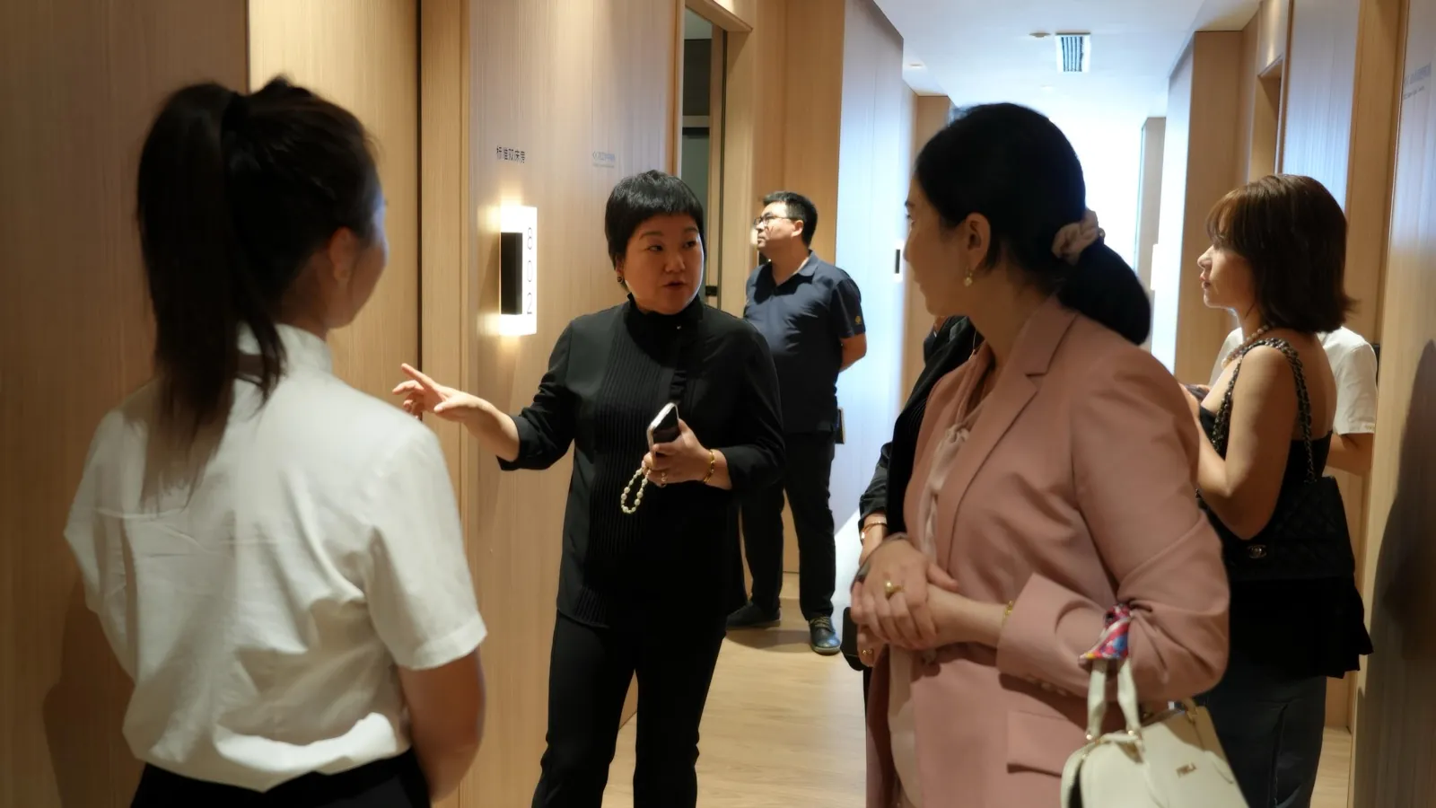 The delegation walking through the Goldea showroom