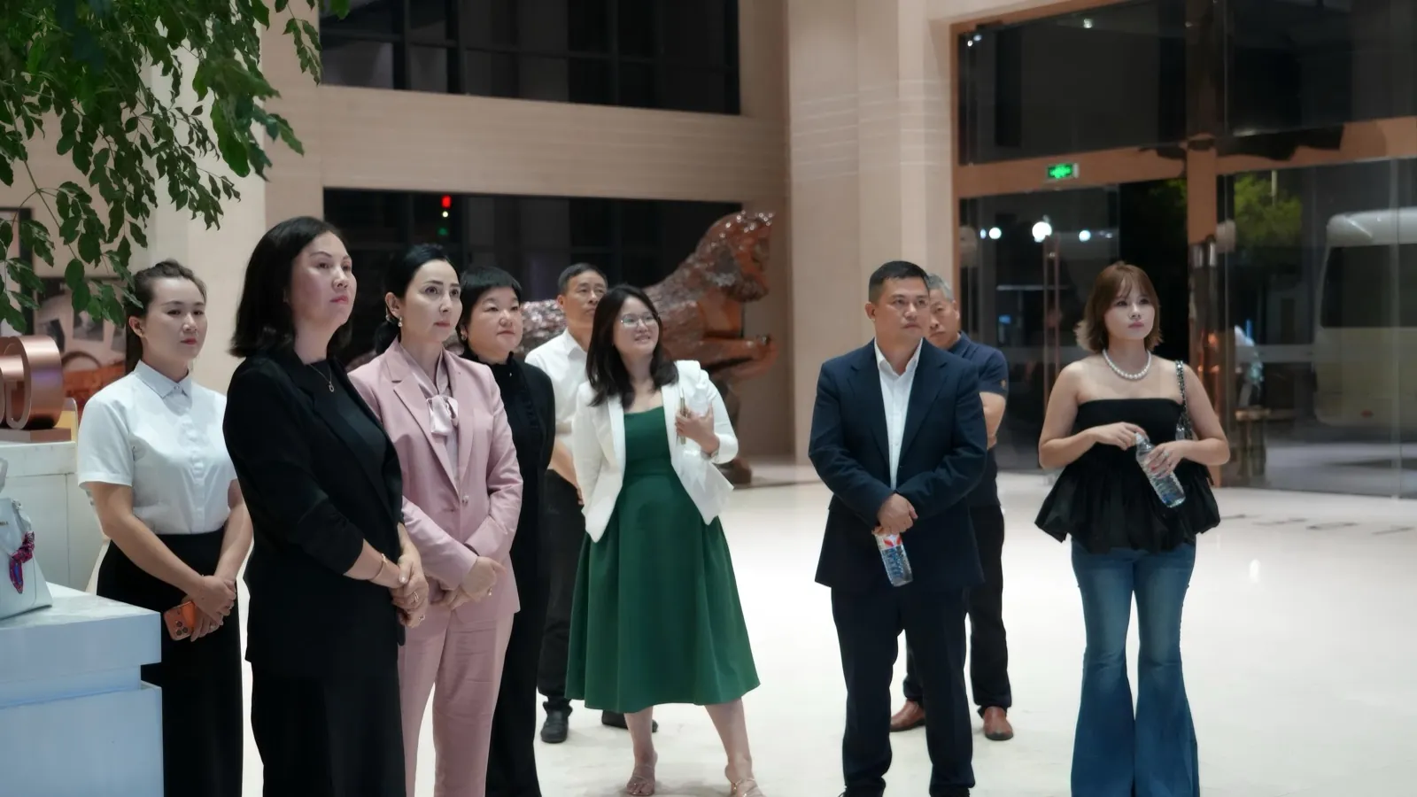 Goldea staff welcoming the Kyrgyz delegation at the entrance of the Goldea flagship showroom