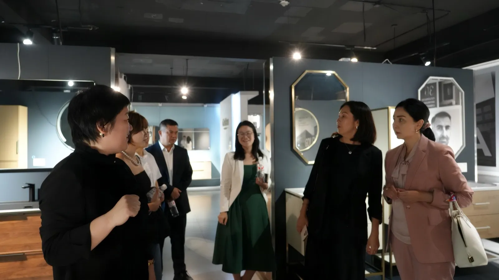 The delegation viewing integrated cabinet solutions at the Goldea showroom